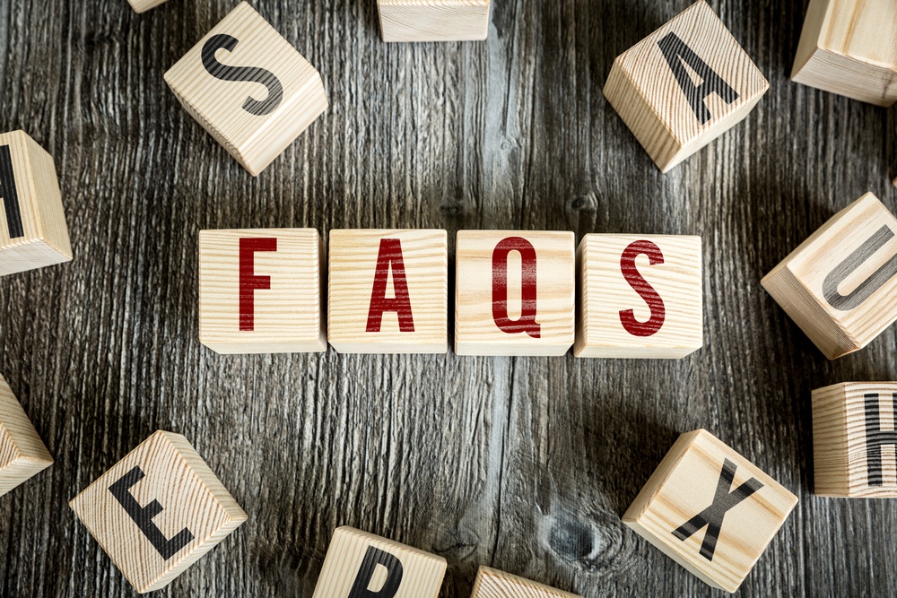 Wooden Blocks With The Text Faqs